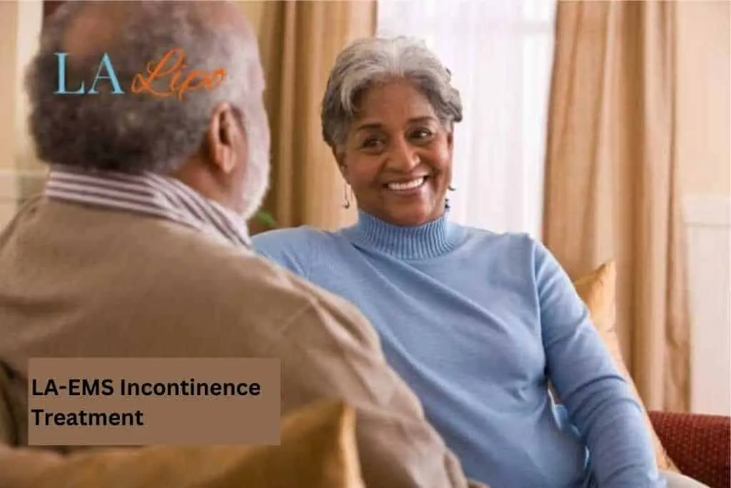 Couple sat smiling at each other - LA-EMS treatment Henley-In-Arden